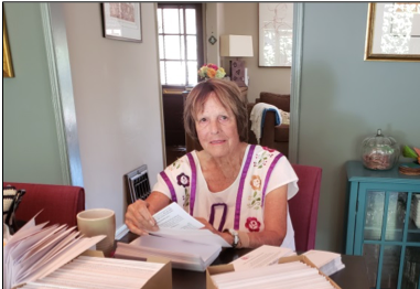 WAGV founder Ann Reiss Lane preparing mailing to charter schools